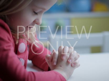 LITTLE GIRL PRAYING