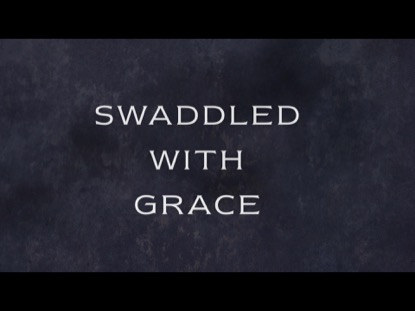 SWADDLED WITH GRACE