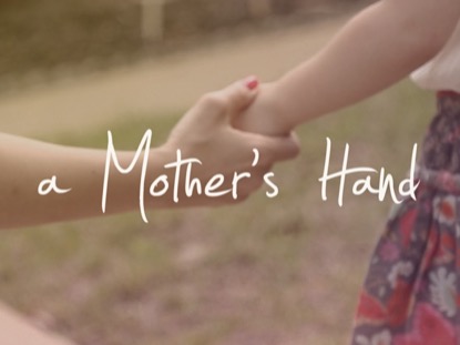 A MOTHER'S HAND TITLE MOTION
