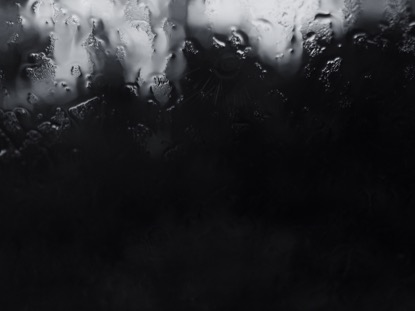 RAIN ON GLASS DARK BW