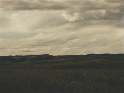 VISTAS CLOUDS OVER FIELD