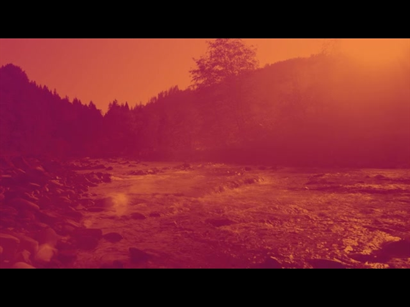 RIVER ROCKS WARM SUNSET