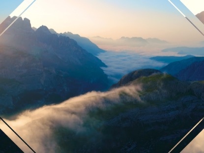 SUNSET AERIAL MOUNTAIN FOG