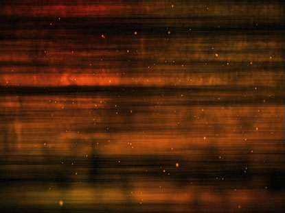 ORANGE GOLD PARTICLE STREAKS
