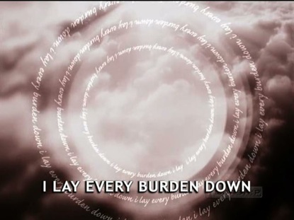 AT THE FOOT OF THE CROSS