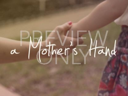 A MOTHER'S HAND TITLE STILL