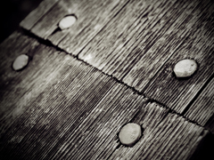 BOARD WITH NAILS