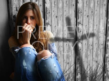 YOUNG WOMAN AND CROSS